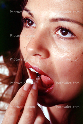 Aspirin, Woman taking a pill