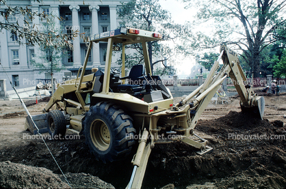 Caterpillar 416 Backhoe Loader, digging a ditch, government building, wheeled tractor, earthmover, earthmoving
