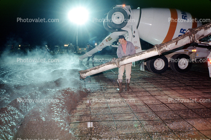 early morning pouring cement for a large floor