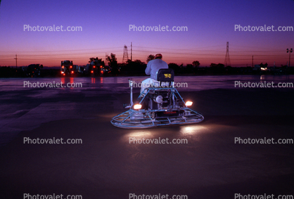 Concrete Power Trowel Finishing Machine, smoothing out cement for a large floor, early morning, Man, Men, Worker, Twilight, Dusk, Dawn
