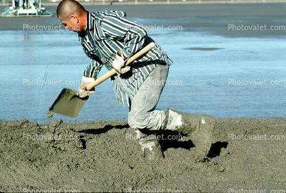 Concrete Pour, shovel, wet cement, boots