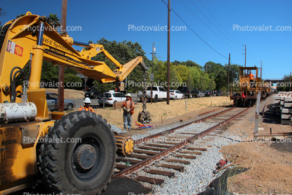 Front Loader, wheeled tractor, Laying down new Rails, 2014, Construction for the new SMART train