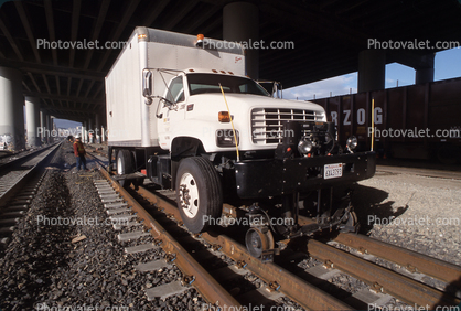 GMC 7500 Truck on Railroad Tracks