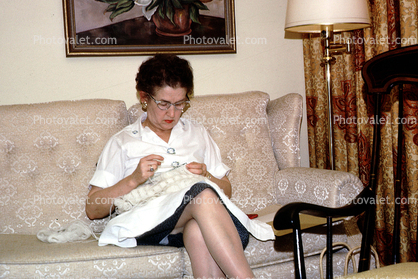 Woman Sewing, couch, sofa, lamp, picture-frame, 1950s