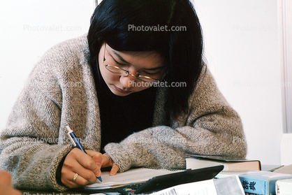 Woman, studying, classroom, books, writing