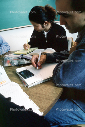 Man, Woman, studying, classroom, chalkboard, books