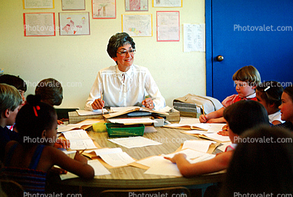 Teacher and Students, classroom, Woman, table