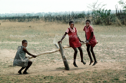 Teeter-totter, Schoolyard, girls, barefoot, Madzongwe