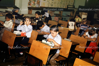 Elementary Schoolchildren, boys, girls, at work, studying, 1950s