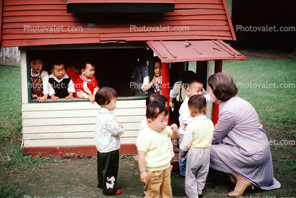 Boys, Girls, Playhouse, toy house, building, teacher, Tokyo Japan, October 1982