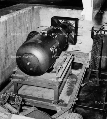 Little Boy Atomic Bomb, loading pit, Enola Gay bomb bay, Tinian island, Mariana Islands, August 1945
