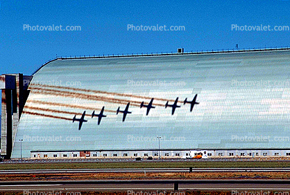 EMB-312 Tucano shadow on a Hangar, Moffett Field, EMB-312 Tucano, Smoke Trails