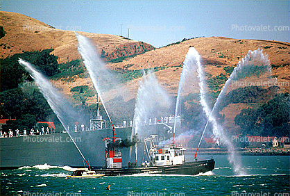 Fireboat Phoenix welcoming the USS Missouri (BB-63), Spraying Water