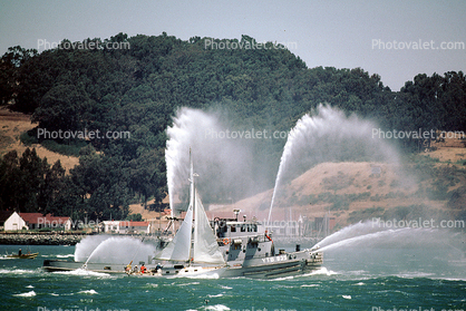 fireboat welcoming the USS Missouri BB-63, YTB 835, Spraying Water