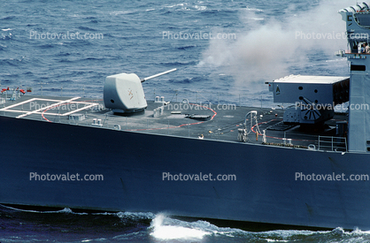 Firing the Mk 45 5-inch/54 caliber lightweight gun, USS Harry W Hill (DD 986), Spruance-class destroyer