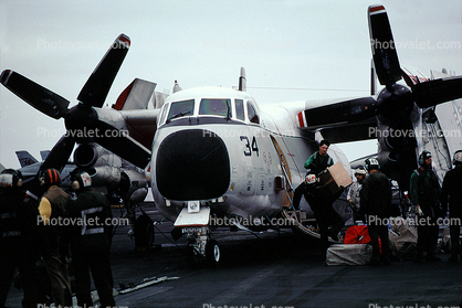 34, Grumman C-2 Greyhound, unloading cargo