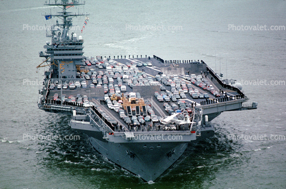 Loaded with cars, moving to new Navy Base, USS Carl Vinson, CVN-70