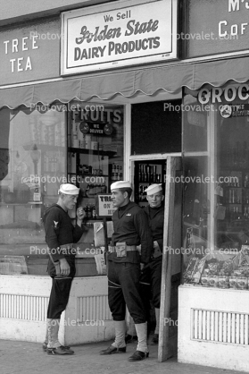 Soldiers guarding a store owned by Japanese, right after Pearl Harbor, WW2, World War-II, WWII, USN, United States Navy, Internment, 1942, 1940s