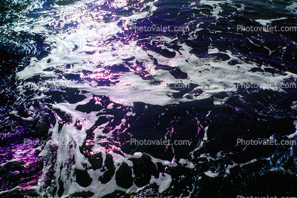 Purple swirls of water