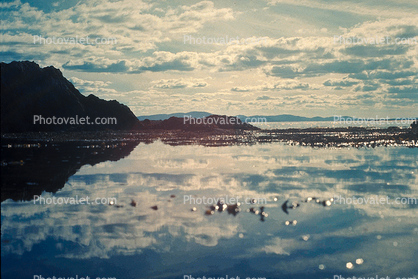 Reflection, Bear Island, clouds