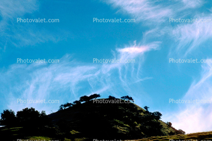 Sun Dog, wispy clouds, hill, Salinas Valley