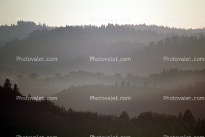 layered mountains, hills, haze