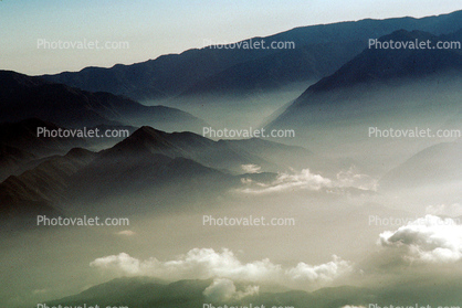 Foggy fingers of myst, coastal mountain ranges