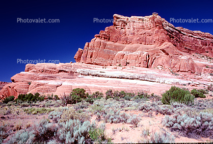 Sandstone Cliff, stratum, strata, layered, sedimentary rock, scrub brush, bush