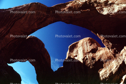 arches, sandstone cliffs, trees