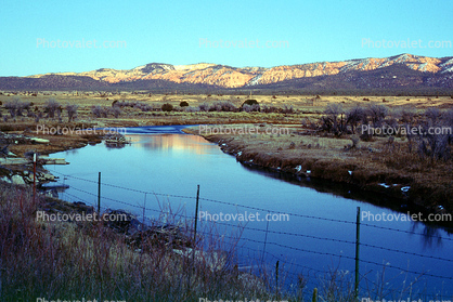 Sevier River, mountain range, barbed wire fence