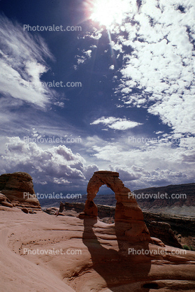 Delicate Arch, Stone, Rock, Clouds, sun, Arches National Park, geologic feature, geoform