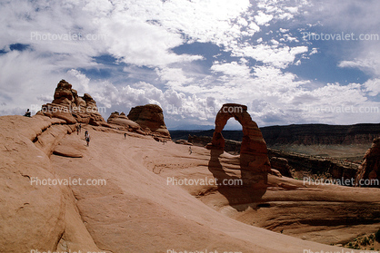 Delicate Arch, Stone, Rock, Clouds, people, hikers, Arches National Park, geologic feature, geoform