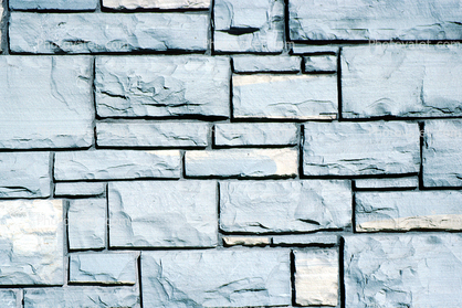 White uneven brick wall
