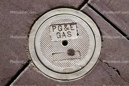 PG&E meter cover, concrete, sidewalk, cement