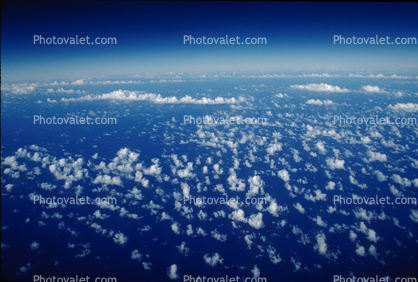 Pacific Ocean flying from California to Japan, Seascape, Cumulus Cloud Puffs, daytime, daylight