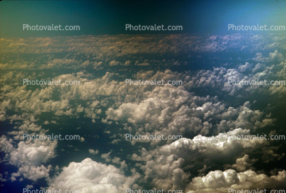 Pacific Ocean flying from California to Japan, daytime, daylight, Cumulus Cloud Puffs, puffy
