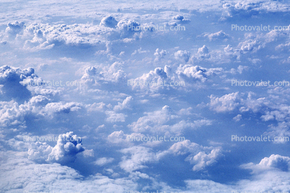 daytime, daylight, cumulus puff clouds, flying over the ocean