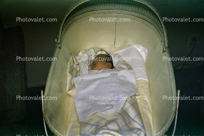 Baby in a Bassinet, girl, newborn, 1950s, Childbirth
