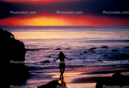 Woman in Sunset Colors in Malibu, California