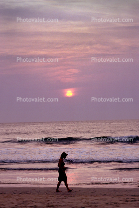 Melancholy Woman Walking on the Beach, Playa de Tamarindo, Costa Rica