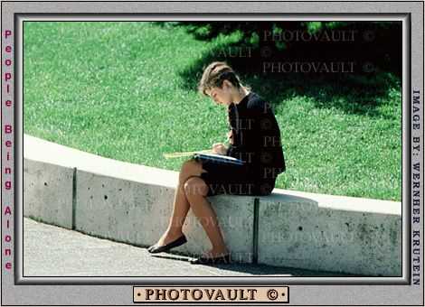 Woman reading at lunchtime