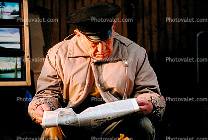Old Man reading Newspaper