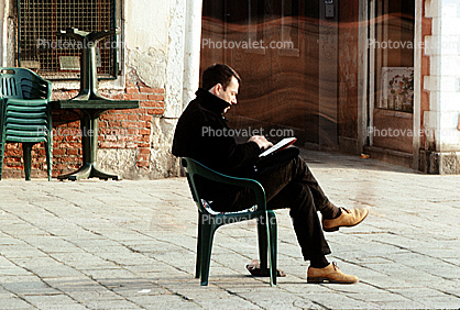 Man, Chair, Reading