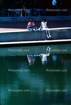Girls, pond, water reflection