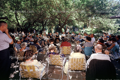 People sitting in Lawn Chairs, Mission Sonora, 1950s