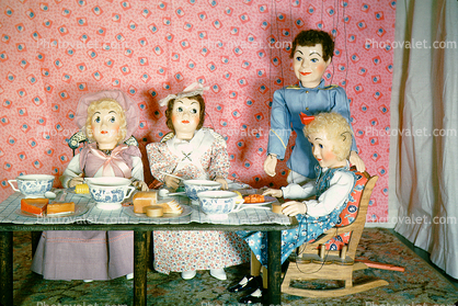 Heidi notices roll by plate, dinner, string puppets, diorama, 1950s