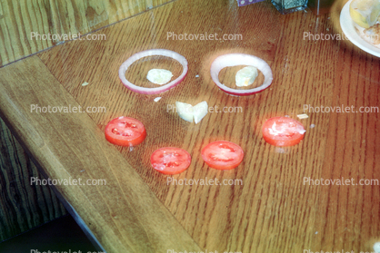tomato and onion face on a table, Pareidolia