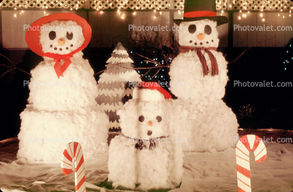 Snowoman, snowman, snowchild, candy canes, night, nighttime