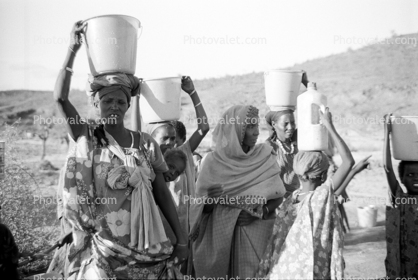 Woman carry's water bucket, Somalia Refugee Camp