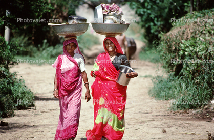 Woman Carrying a Balanced Tub on their head, Boral Village, Gujarat